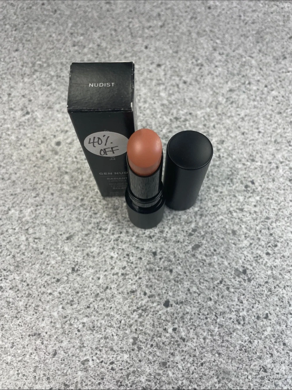 Peachy Nude Cream Lipstick - Warm Peach Shade color on box Nudist